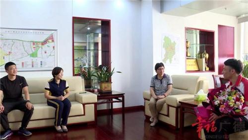 陈红英会见全运会冠军王志伟